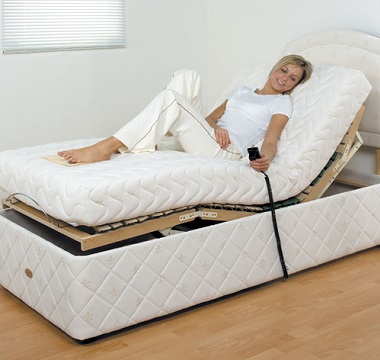 Lady lying on electric adjustable bed